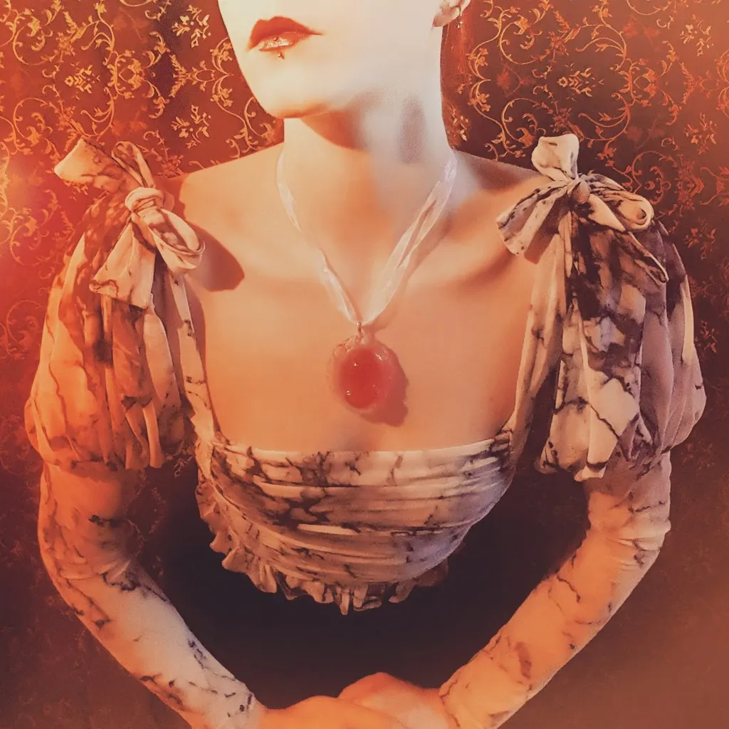 A resin pendant, worn